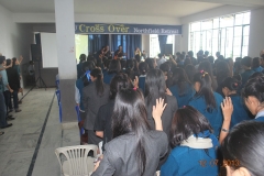 A packed hall full of teachers and students