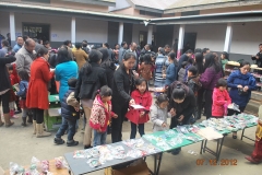 Parents and students buy craft items
